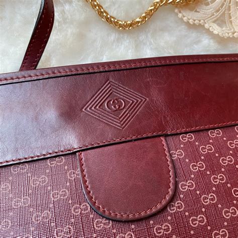 vintage gucci clutch burgundy|gucci bag old collection.